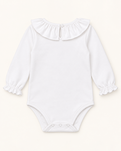 Body de bebé blanco con cuello de volante