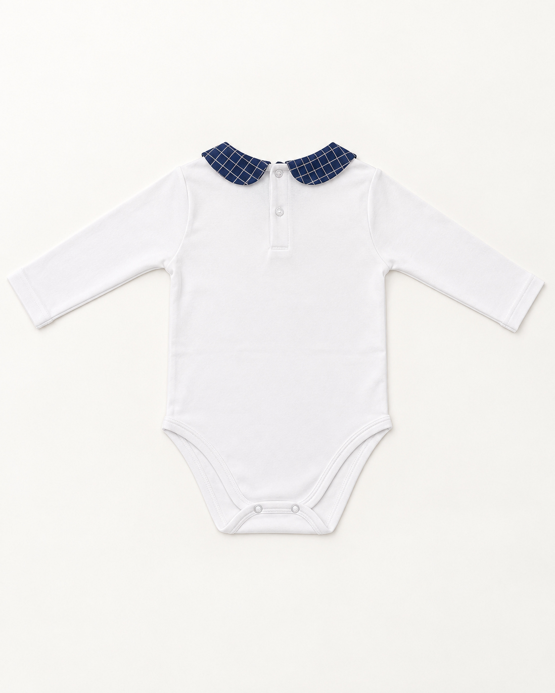 Body de bebé blanco con cuello azul marino