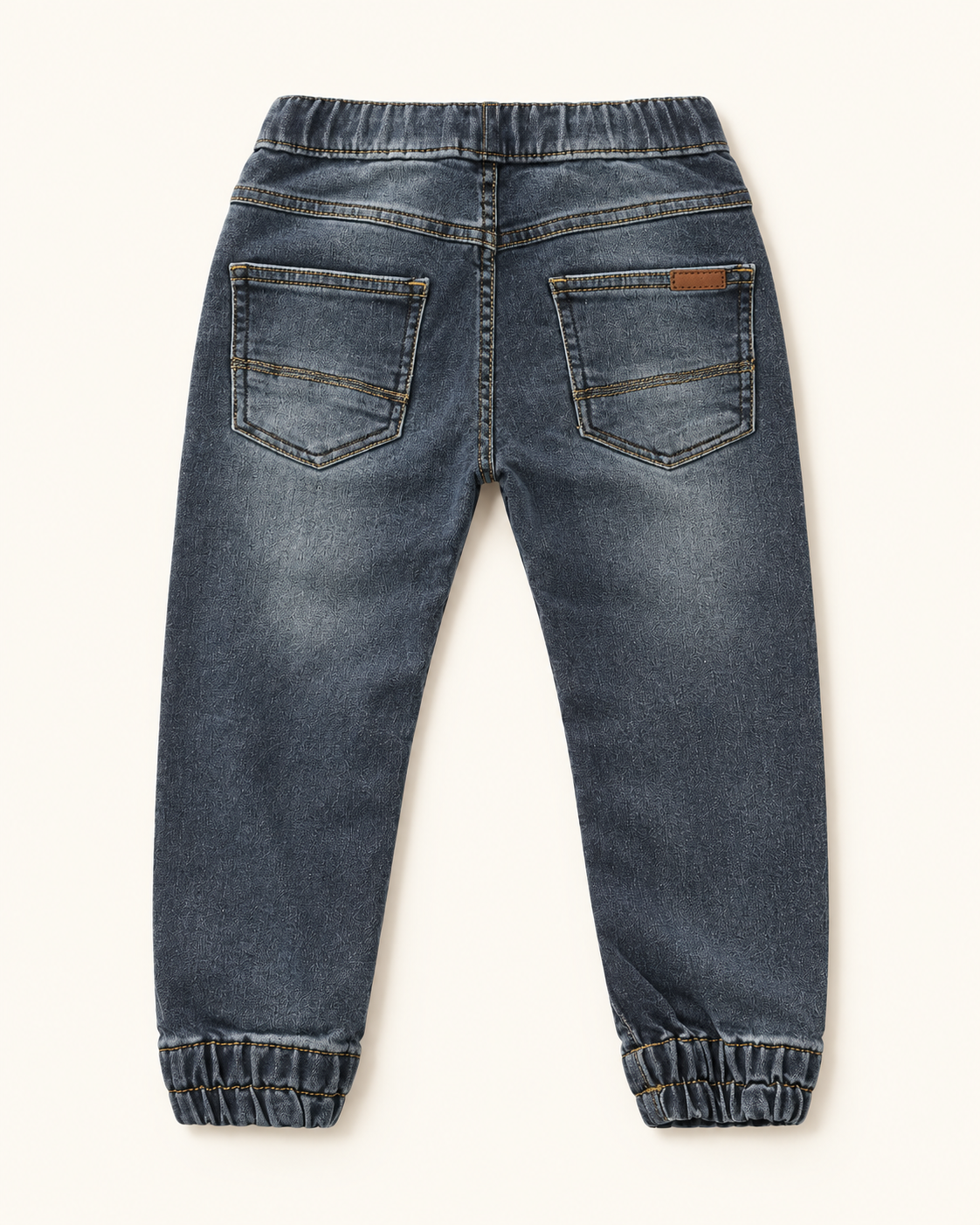 Pantalón vaquero de bebé con puño elástico