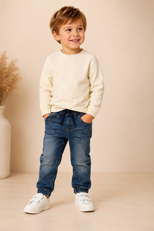 Pantalón vaquero de bebé con puño elástico