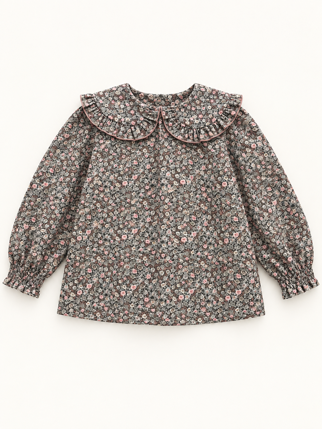 Blusa de niña con flores y cuello redondo